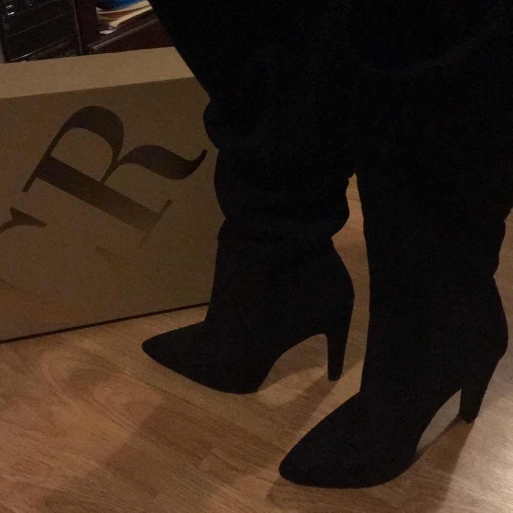 Black knee length boots